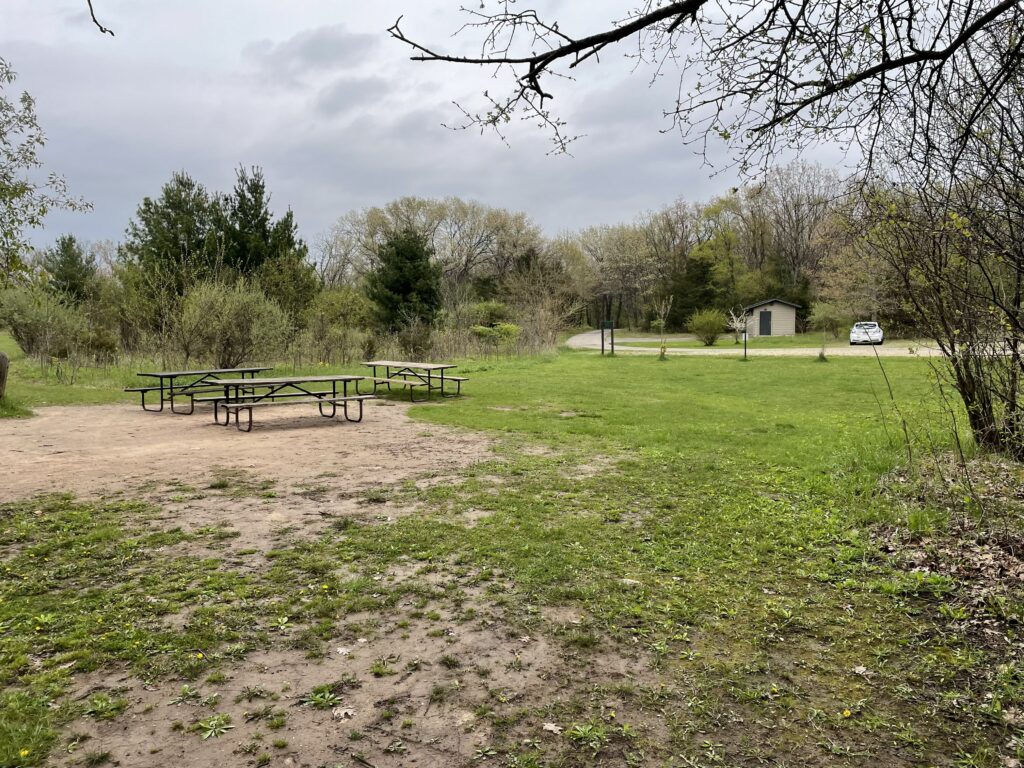 Early morning at Kettle Moraine campground in late April 2026 with sun through mist.